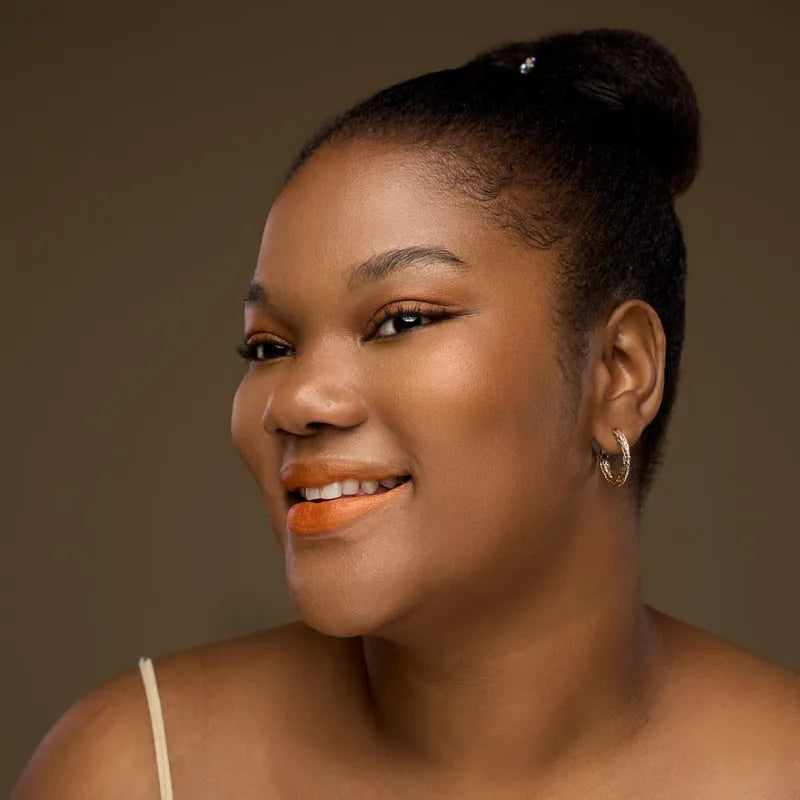 Baume teinté Nandi Wuré – corail éclatant – couleur fraîche et lumineuse pour maquillage naturel