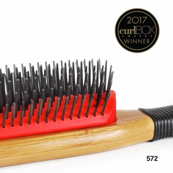 Brosse démêlante à picots amovibles pour faciliter le nettoyage de produits coiffants - Evolve