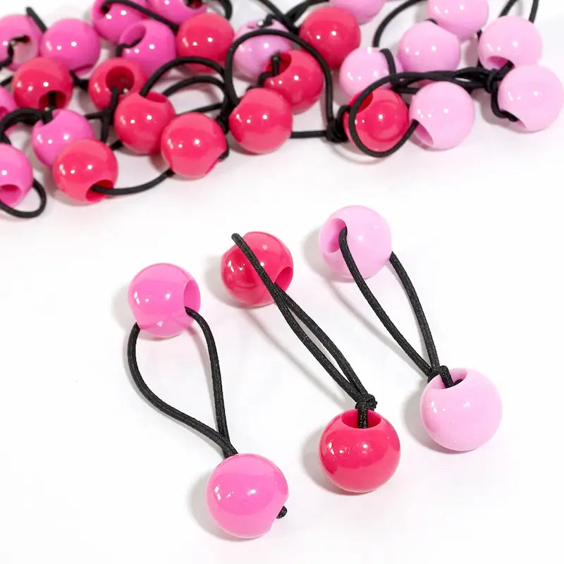 Lot de 16 élastiques cheveux avec perles roses pour enfant. Idéal pour petits chignons ou queues de cheval