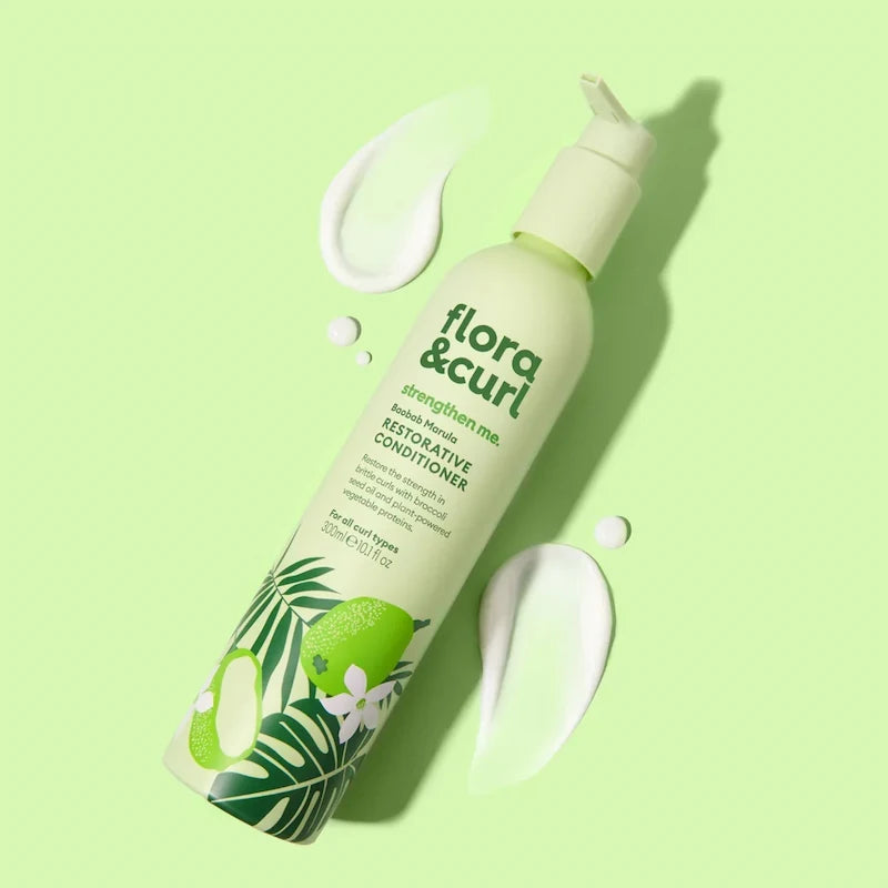 Shampoing Baobab Marula Flora and Curl pour nettoyer en douceur et renforcer les cheveux bouclés, frisés et crépus