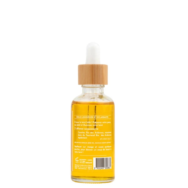 huile de carotte composée de carottes bios ayant macérées dans de l’huile de tournesol.