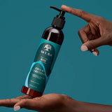 Le leave-in sans rinçage As I Am Bond est un soin hydratant et fortifiant pour les cheveux secs et abimés.