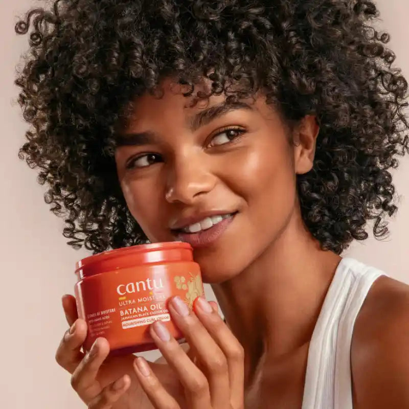 Curl Cream Cantu Ultra Moisture enrichie en huile de batana et huile de ricin noir pour hydrater et définir les boucles sur cheveux crépus, bouclés frisés