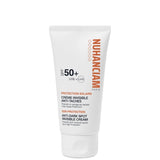 Crème solaire anti taches Visage SPF 50+ Invisible et Sans traces blanches . Adaptée aux peaux noires métissées