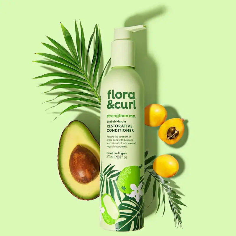 Shampoing fortifiant pour cheveux bouclés, frisés et crépus fragilisés aux huiles de baobab et marula aidant à nettoyer, renforcer et limiter la casse