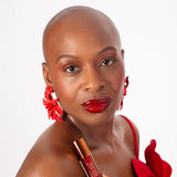 Velvet Gloss Wuré rouge intense effet brillant lèvres pulpeuses et maquillage sophistiqué