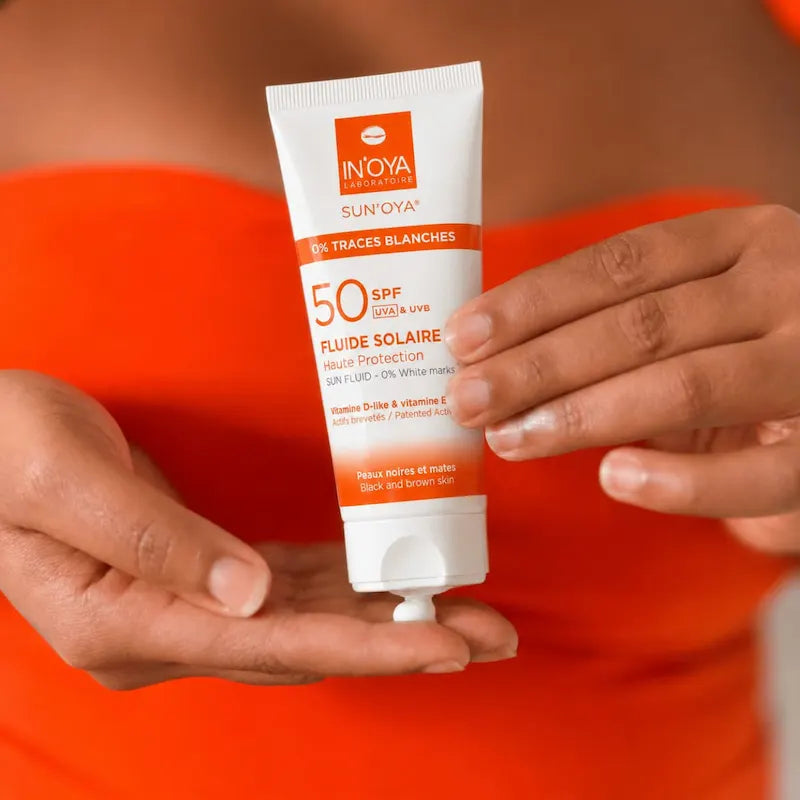 ecran solaire peau noire Mon Fluide Solaire SUN'OYA® - Laboratoire IN'OYA Crème solaire SPF 50 dédiée aux peaux noires, mates et métisses.