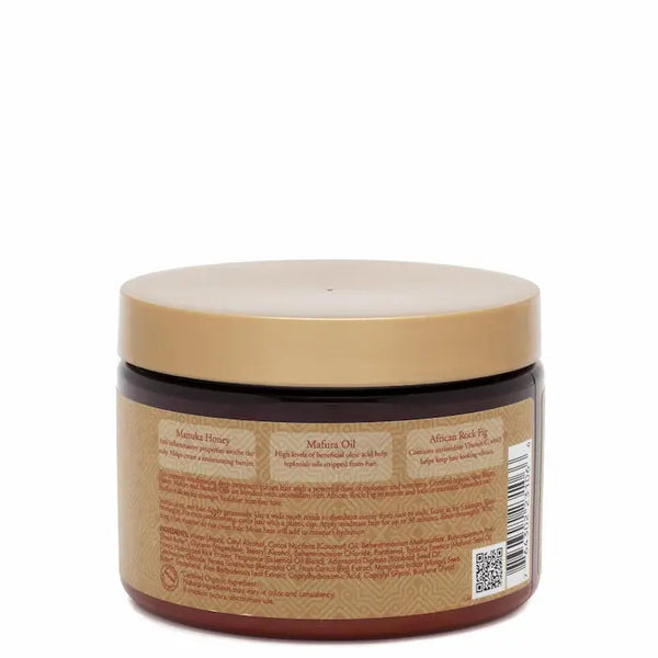 Le Masque cheveux Manuka Honey & Mafura Oil hair de Shea Moisture contient du Miel de Manuka, de l’huile de Mafura et de Baobab ainsi que de l’extrait de figuier Africain.