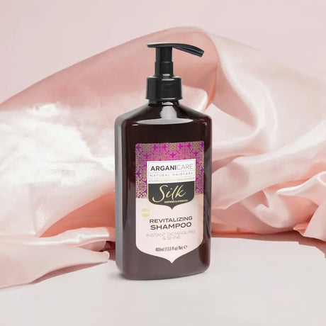 Assouplie et apporte un éclat naturel aux cheveux ternes, bouclés à crépus - Arganicare