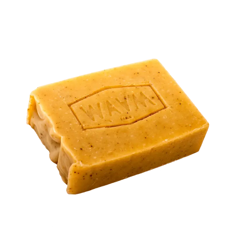 Savon solide visage et corps à la busserole, curcuma et lys pour illuminer le teint et agir sur les taches sur peau noire, mate ou métissée WAAM